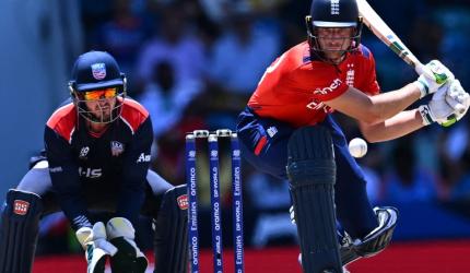 T20 WC PIX: Buttler blazes England into semis