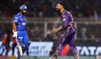 IPL PIX: KKR outclass MI; storm into play-offs