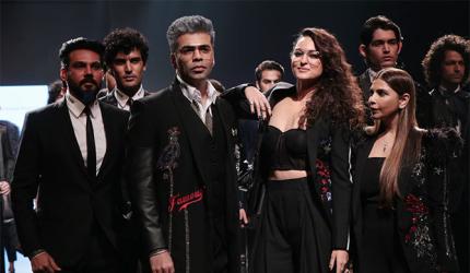 Video: Sonakshi Sinha walks the ramp, Karan Johar steals the show!