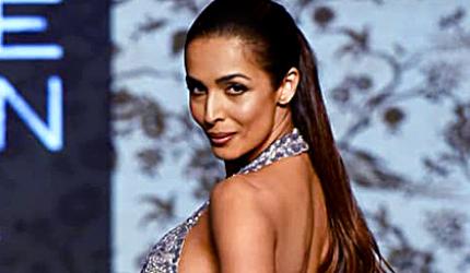 WATCH: Malaika reveals svelte bod in a backless gown