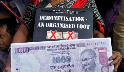 Govt, Opposition battle it out on note ban anniversary