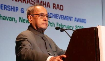 Amid Oppn uproar, Pranab hails EC for 'perfect' polls