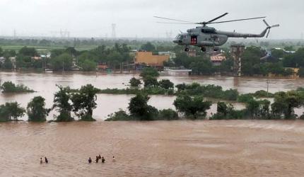 Guj floods: IAF rescues men clinging to electric pole