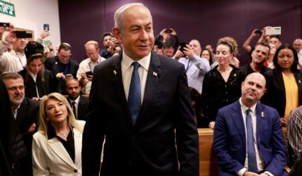 Defiant Netanyahu takes stand in landmark graft trial