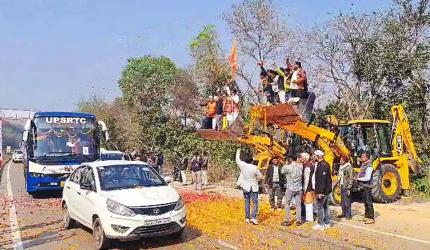 SEE: Bulldozers used to shower petals on UP lawmakers