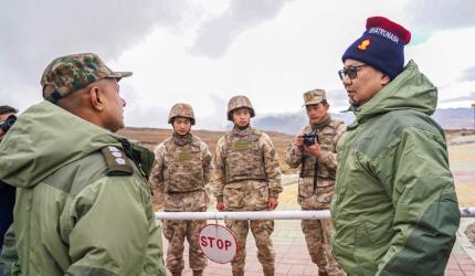 Rijiju interacts with Chinese soldiers near Tawang