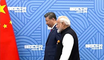 Must find 'right path' to live in harmony: Xi to Modi