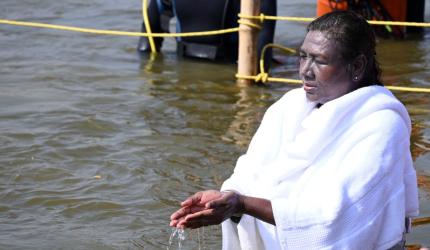 PHOTOS: Prez Murmu takes holy dip at Maha Kumbh 