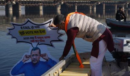 BJP leader immerses Kejriwal's effigy in Yamuna  