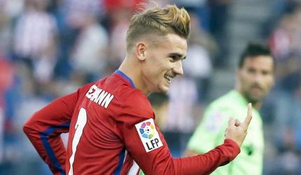 Griezmann snubs Barcelona to stay at Atletico