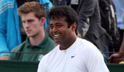 Paes-Hingis race into mixed doubles quarters