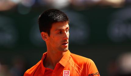 Djokovic handed tough Wimbledon opener, Federer has it easy