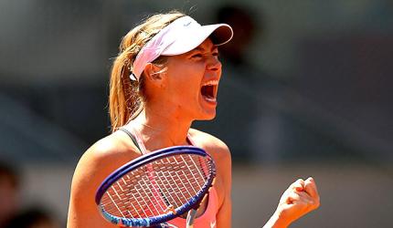 Madrid Open: Sharapova battles past Wozniacki into semis