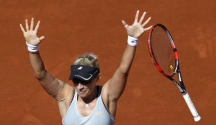 PHOTOS: Third seed Halep knocked out of French Open