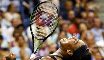 Serena trumps sister Venus to keep calendar Slam on track