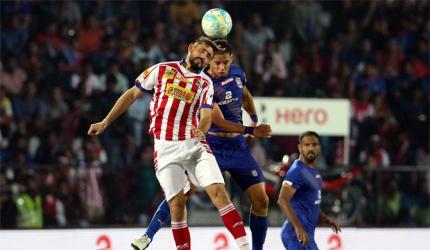 PHOTOS: 10-man Kolkata hold Mumbai goalless to enter ISL final