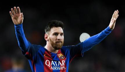 PHOTOS: Messi magic helps Barcleona cut deficit to Real