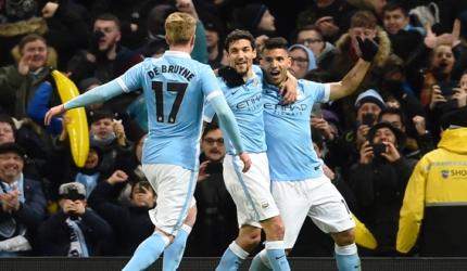 Aguero heads Man City into League Cup final against Liverpool