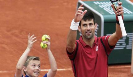 Djokovic, Serena avoid distractions of French Open 'circus'