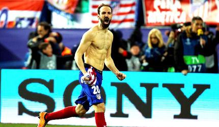 Champions League PIX: Atletico win thrilling shootout to reach quarters