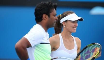 Paes-Hingis knock out fourth seeds, enter mixed doubles quarters