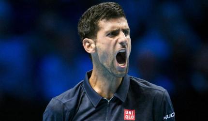 PHOTOS: Djokovic digs deep to repel Raonic onslaught