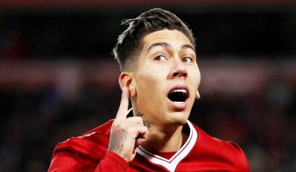 EPL PHOTOS: Firmino strikes twice as Liverpool crush Swansea