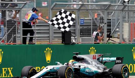 Hamilton wins British Grand Prix to slash Vettel's lead