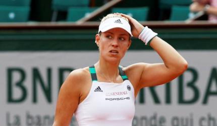 French Open PIX: Kerber stunned, Kvitova wins on return; Thiem advances