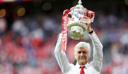 Wenger signs new two-year deal with Arsenal