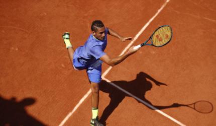 French Open: Kyrgios gets down and dirty with Grosjean in his box