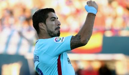 PHOTOS: Suarez inspires Barca, Real and Atletico in derby stalemate