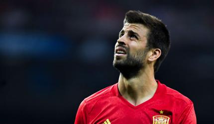 Catalan Pique jeered by fans at Spain training session