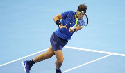 China Open: Nadal survives Pouille fright to advance