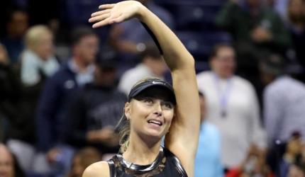 Sharapova back in business on and off court