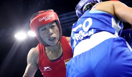 Mary Kom assured of medal, Vikas enters quarters at CWG