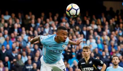 EPL: Man City power past Swansea; Arsenal win