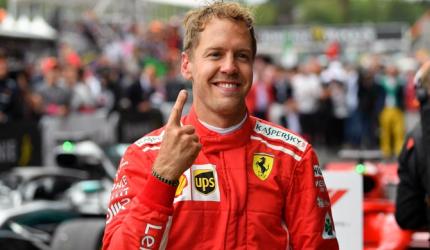 Ferrari's Vettel wins in Belgium to rein in Hamilton