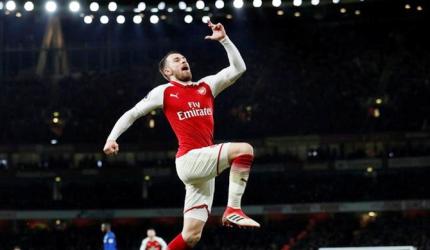 EPL PICS: Ramsey 'tricks' as Arsenal thrash Everton