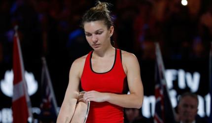 No escapes for brave Halep in third Grand Slam final