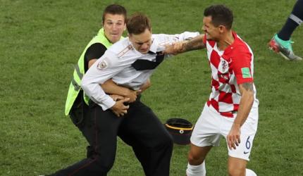 PHOTOS: Anti-Kremlin protesters invade pitch during World Cup final