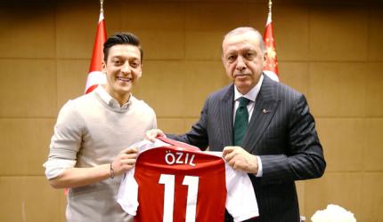 German soccer star Ozil defends photo with Erdogan