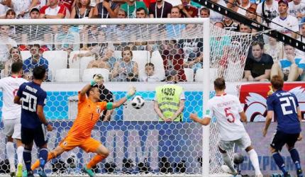 PICS: Japan lose to Poland, but advance on lesser yellow cards than Senegal