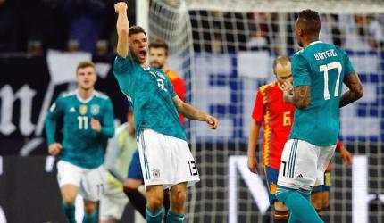 PHOTOS: Spain hold Germany; Brazil and Portugal win but France lose