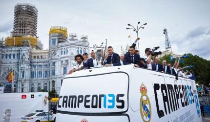 PHOTOS: Champions Real Madrid paint the town white during parade