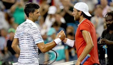 Djokovic beats Pouille to reach Cincinnati semi-finals