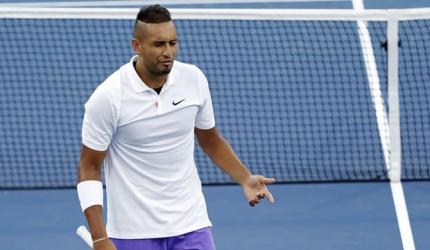 Kyrgios mostly keeps his cool to see off Hoang