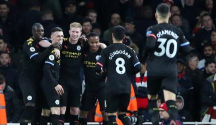 EPL PIX: City down Arsenal, United held