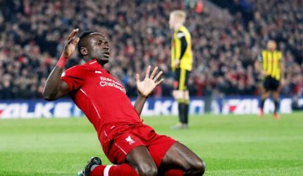 EPL PHOTOS: Liverpool, City march on as Spurs slip again