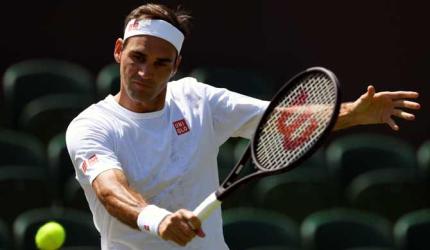 Federer opposes on-court coaching